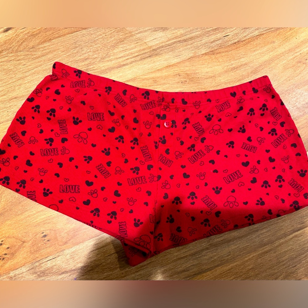 Red “love” booty shorts . Never worn